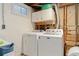 Basement laundry area with modern washer and dryer, offering convenience and functionality at 3100 W 94Th Ave, Westminster, CO 80031