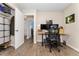 This home office has a simple desk with a nice black chair and overlooks a full bathroom for convenience at 3100 W 94Th Ave, Westminster, CO 80031