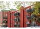 A red brick apartment building with wrought iron balconies at 200 N Pearl St # 404, Denver, CO 80203