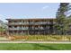 Exterior of building with manicured lawn and greenery at 200 N Pearl St # 404, Denver, CO 80203