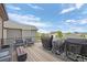Back deck with a view featuring patio seating, outdoor cooking and dining areas at 7315 Blue Water Dr, Castle Rock, CO 80108