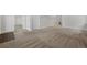 Large finished basement with neutral carpet, recessed lights and a wood accent floor at 7315 Blue Water Dr, Castle Rock, CO 80108