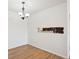 Simple dining area with hardwood floors and chandelier at 14465 E 1St Dr # C7, Aurora, CO 80011