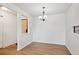 Dining area with hardwood floors and chandelier at 14465 E 1St Dr # C7, Aurora, CO 80011