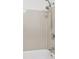 Beige tiled shower with handheld shower head at 14465 E 1St Dr # C7, Aurora, CO 80011