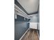 Walk-in closet with built-in shelving and cabinets at 5250 S Huron Way # 1-204, Littleton, CO 80120