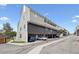 Modern multi-Gathering exterior with a parking area beneath at 5250 S Huron Way # 1-204, Littleton, CO 80120