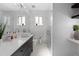 Modern bathroom with marble tile and a floating vanity at 885 S Sherman St, Denver, CO 80209