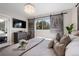 Spacious bedroom with a king-size bed and sliding barn doors at 885 S Sherman St, Denver, CO 80209