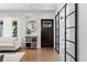 Elegant entryway with a dark wood door and glass panels at 885 S Sherman St, Denver, CO 80209