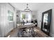 Bright home office featuring a desk and large mirror at 885 S Sherman St, Denver, CO 80209