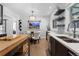 Eat-in kitchen with modern cabinets and glass-top table at 885 S Sherman St, Denver, CO 80209