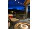 Evening view of deck with fire pit and city view at 14204 W 88Th Dr # C, Arvada, CO 80005