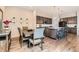 Bright dining area adjacent to kitchen with seating for six at 14204 W 88Th Dr # C, Arvada, CO 80005