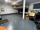 Garage with epoxy floor and storage at 14204 W 88Th Dr # C, Arvada, CO 80005