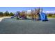 Modern playground with climbing structures and slides at 14204 W 88Th Dr # C, Arvada, CO 80005