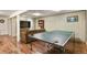 Spacious basement featuring a TV, game tables and recreation area at 6392 S Lafayette St, Centennial, CO 80121