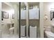 Cozy bathroom featuring a stackable washer and dryer at 2480 W Caithness Pl # 5, Denver, CO 80211