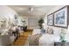 Beautifully decorated bedroom with wood floors and stylish furniture at 2480 W Caithness Pl # 5, Denver, CO 80211