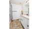 Well-lit bathroom with a shower/tub combination and a white vanity at 15333 E 98Th Pl, Commerce City, CO 80022