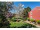 Backyard with walking path and large trees at 2690 E Otero Pl # 7, Centennial, CO 80122