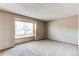 Neutral bedroom featuring a carpeted floor, window with natural light and neutral walls at 2690 E Otero Pl # 7, Centennial, CO 80122