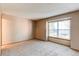 Neutral bedroom featuring a carpeted floor, window with natural light and neutral walls at 2690 E Otero Pl # 7, Centennial, CO 80122