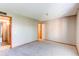 Bedroom featuring carpet, natural light, and access to other rooms at 2690 E Otero Pl # 7, Centennial, CO 80122