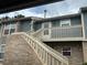 Inviting condo exterior featuring a private balcony, well-maintained siding, and convenient stair access at 2690 E Otero Pl # 7, Centennial, CO 80122
