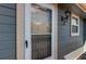 Close-up of the front door, showcasing the exterior paint and hardware at 2690 E Otero Pl # 7, Centennial, CO 80122