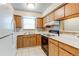 Bright kitchen featuring plenty of counter space, cabinets, and appliances at 2690 E Otero Pl # 7, Centennial, CO 80122
