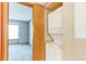 Interior view of a laundry room with a stackable washer and dryer and carpet at 2690 E Otero Pl # 7, Centennial, CO 80122