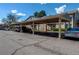 Covered parking and building exterior at 2690 E Otero Pl # 7, Centennial, CO 80122