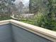 Scenic community pool and garden view from the apartment's private balcony at 2690 E Otero Pl # 7, Centennial, CO 80122