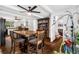View of the open concept floorplan connecting the dining room, kitchen, and living room at 2730 S Jay St, Denver, CO 80227