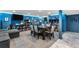 Finished basement game room with a large table, sofa, game shelves, and blue lighting at 2730 S Jay St, Denver, CO 80227