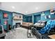 Inviting living room with stone fireplace, cozy seating, and soft lighting at 2730 S Jay St, Denver, CO 80227