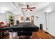 Spacious recreation room with wood floors, a pool table, and abundant natural light at 2730 S Jay St, Denver, CO 80227