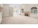 Bright living room with a fireplace and arched windows for natural light at 5946 S Jellison St # F, Littleton, CO 80123
