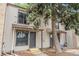 Charming two-story townhome with well-maintained siding and a welcoming entrance at 3550 S Harlan St # 105, Denver, CO 80235
