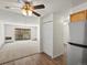 Spacious carpeted living room with access to exterior balcony at 9385 E Center Ave # 1B, Denver, CO 80247
