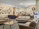 The lobby features comfortable seating, decorative artwork, and a welcoming atmosphere at 9385 E Center Ave # 1B, Denver, CO 80247