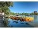 Scenic lake view with paddle boats available for rent on a clear sunny day in the community at 1259 S Elizabeth St, Denver, CO 80210