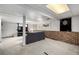 Basement recreational room has light grey carpet, a gray sofa and a dart board at 356 Aquarius Ct, Littleton, CO 80124