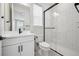 Modern bathroom with sleek subway tile shower, contemporary fixtures, and a clean, minimalist design for a spa-like experience at 6851 Copper Sky Cir, Castle Pines, CO 80108