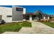The Canyon House community center with a modern design, well-maintained landscaping, and inviting entryway at 6851 Copper Sky Cir, Castle Pines, CO 80108