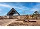 Entrance to The Canyons at Castle Pines community, featuring a modern architectural design at 6851 Copper Sky Cir, Castle Pines, CO 80108