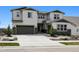 Charming two-story home with a three car garage and professionally landscaped front yard at 6851 Copper Sky Cir, Castle Pines, CO 80108