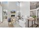 Bright living room featuring a cozy fireplace and modern decor at 6851 Copper Sky Cir, Castle Pines, CO 80108
