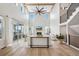 Bright living room with high ceilings, fireplace, and modern decor at 6851 Copper Sky Cir, Castle Pines, CO 80108